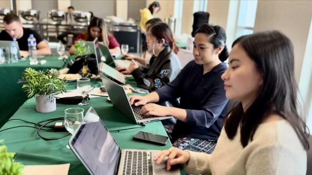 Workers working at the office of One PR