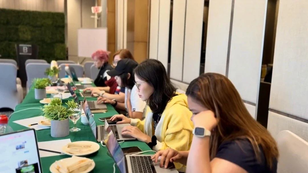 Workers working at the office of One PR